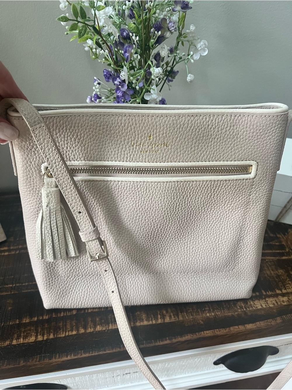 kate spade Light Beige Pebbled Leather Crossbody purse with Tassel